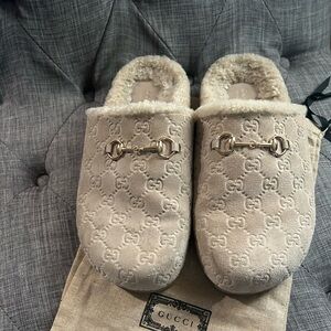 Gucci Cream Shearling Mules with Gold Accents